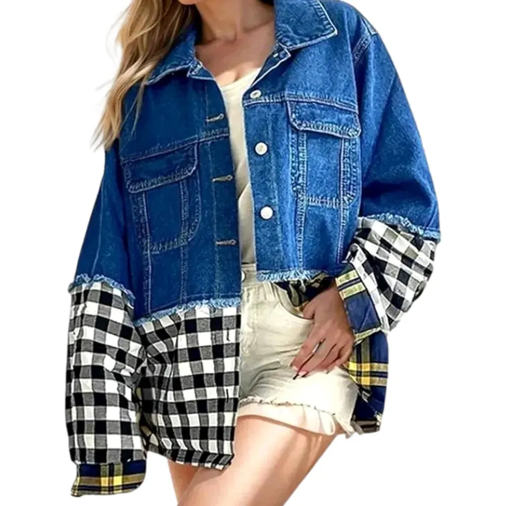 Cropped distressed women's denim jacket