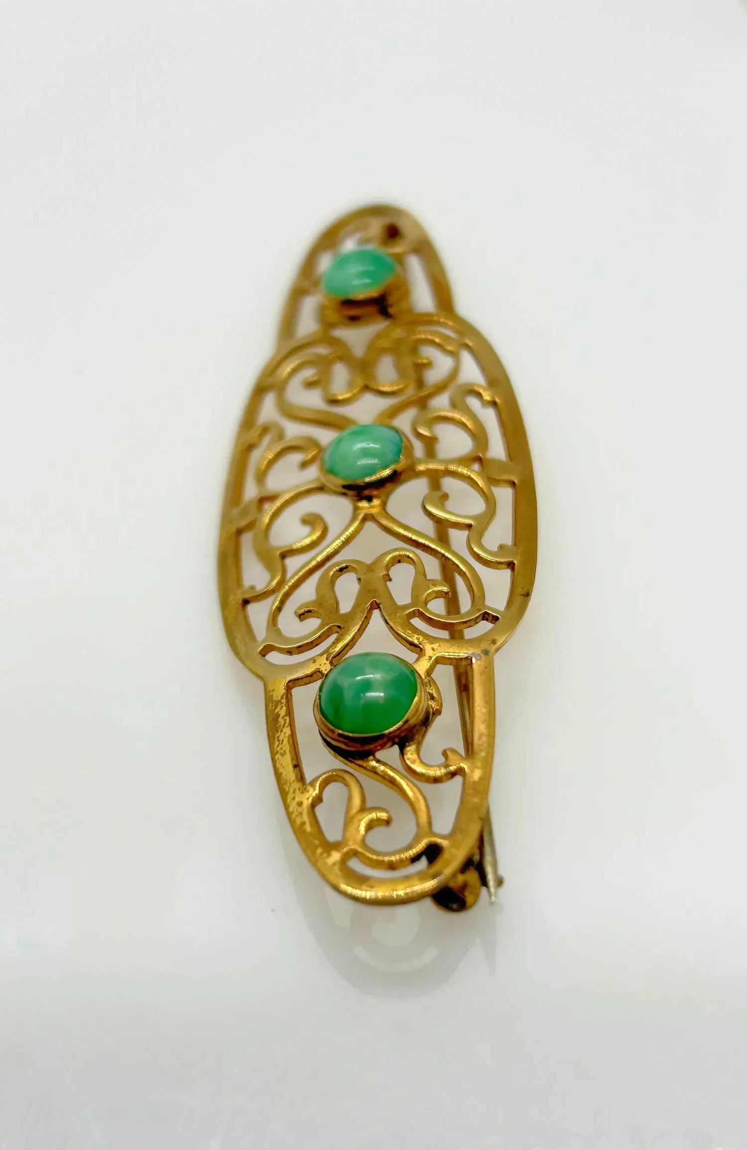 Elegant 1920s Art Deco Brooch with Green Stones