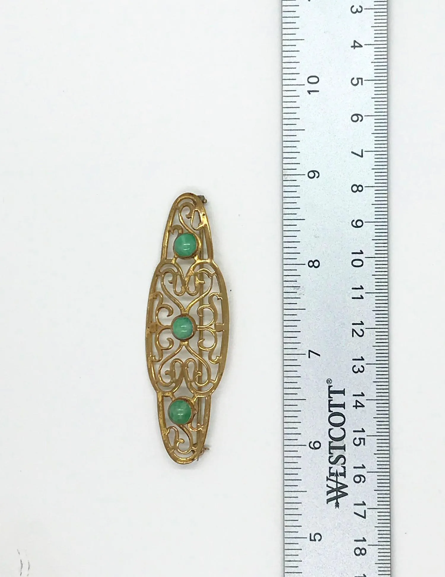 Elegant 1920s Art Deco Brooch with Green Stones