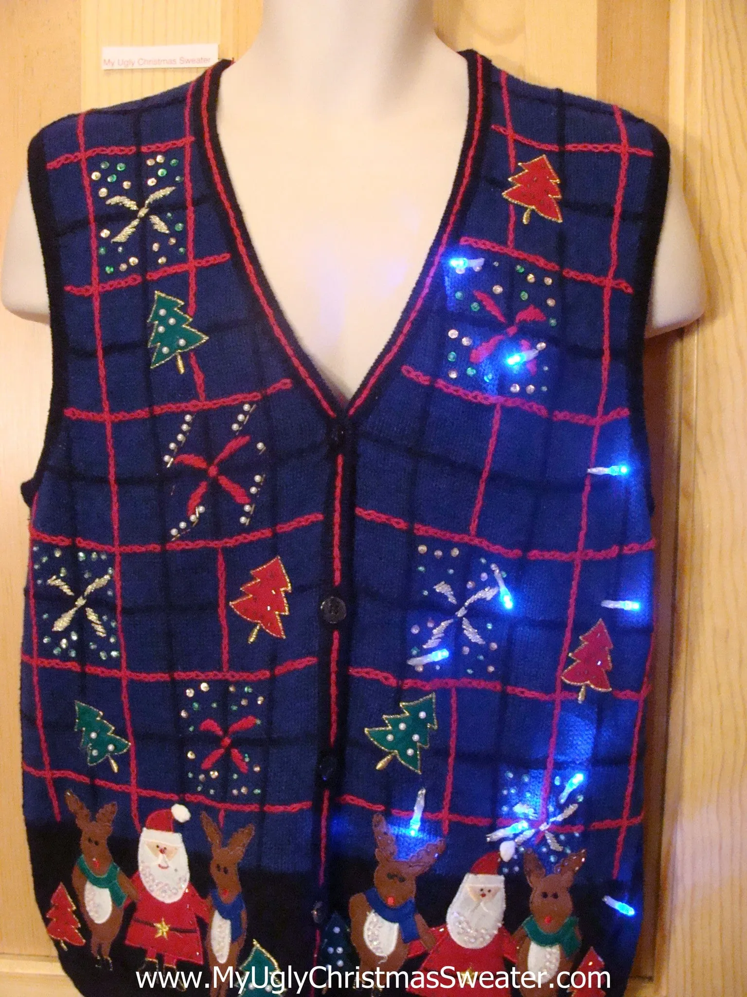 Need to Buy Christmas Sweaters? Blue Light Up Sweater Vest Reindeer Santa